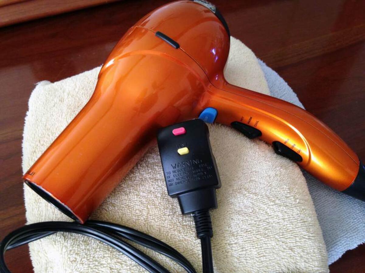 What the Reset Button on Your Hair Dryer Is For and When to Use It UL